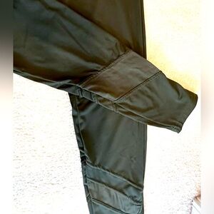 Green legging, with mesh detail on lower calf. Size M. Great condition.